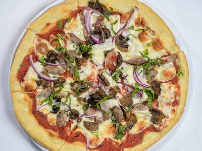 Calabrese pizza with Sicilian sausage, mushrooms, onions and mozzarella