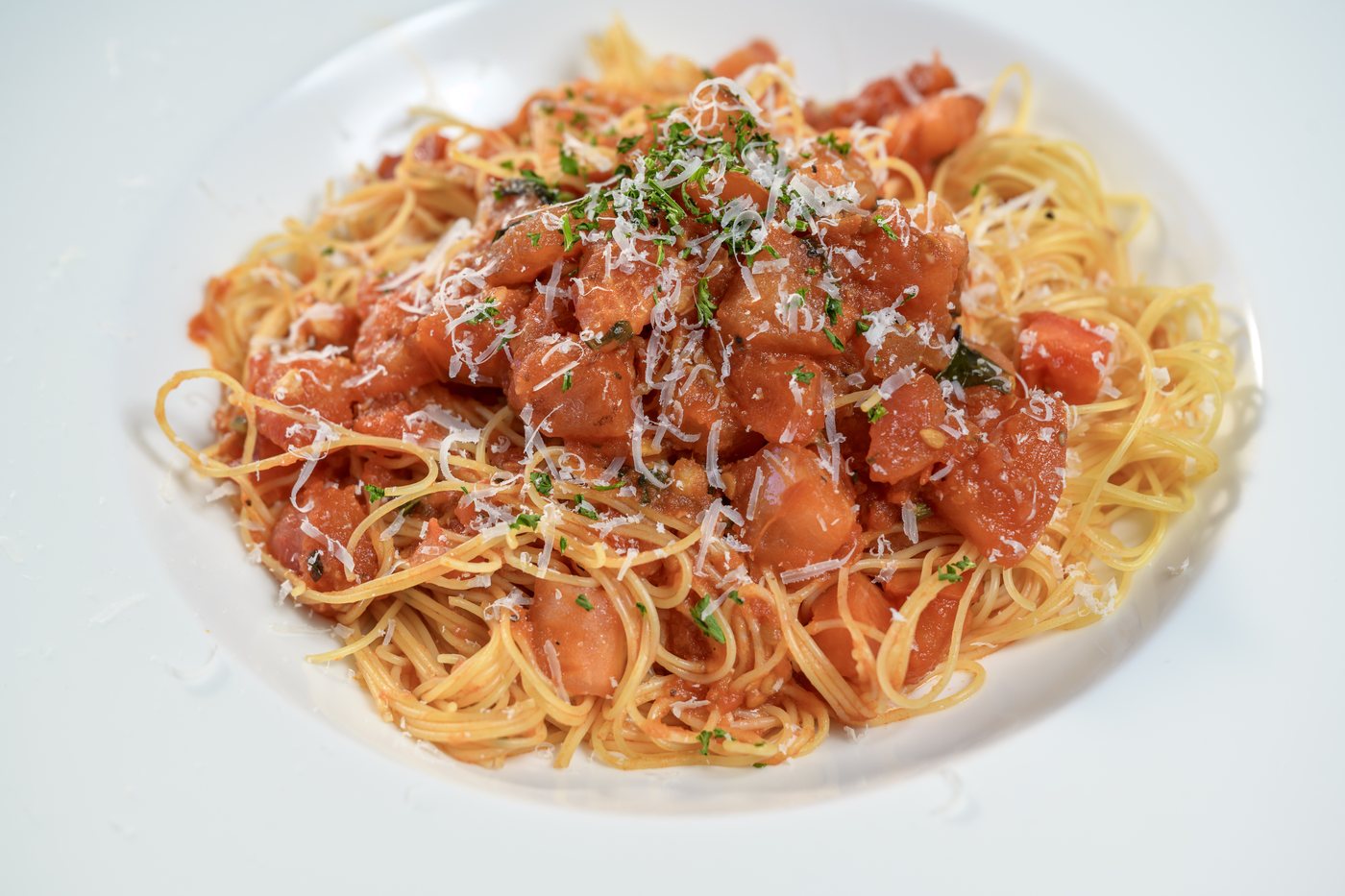 Angel hair pasta with fresh tomatoes, garlic, basil and olive oil