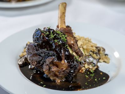Braised lamb shank over wild mushroom risotto