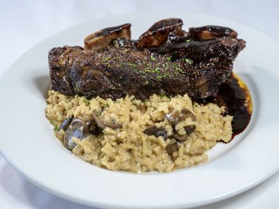 Braised beef short rib over wild mushroom risotto
